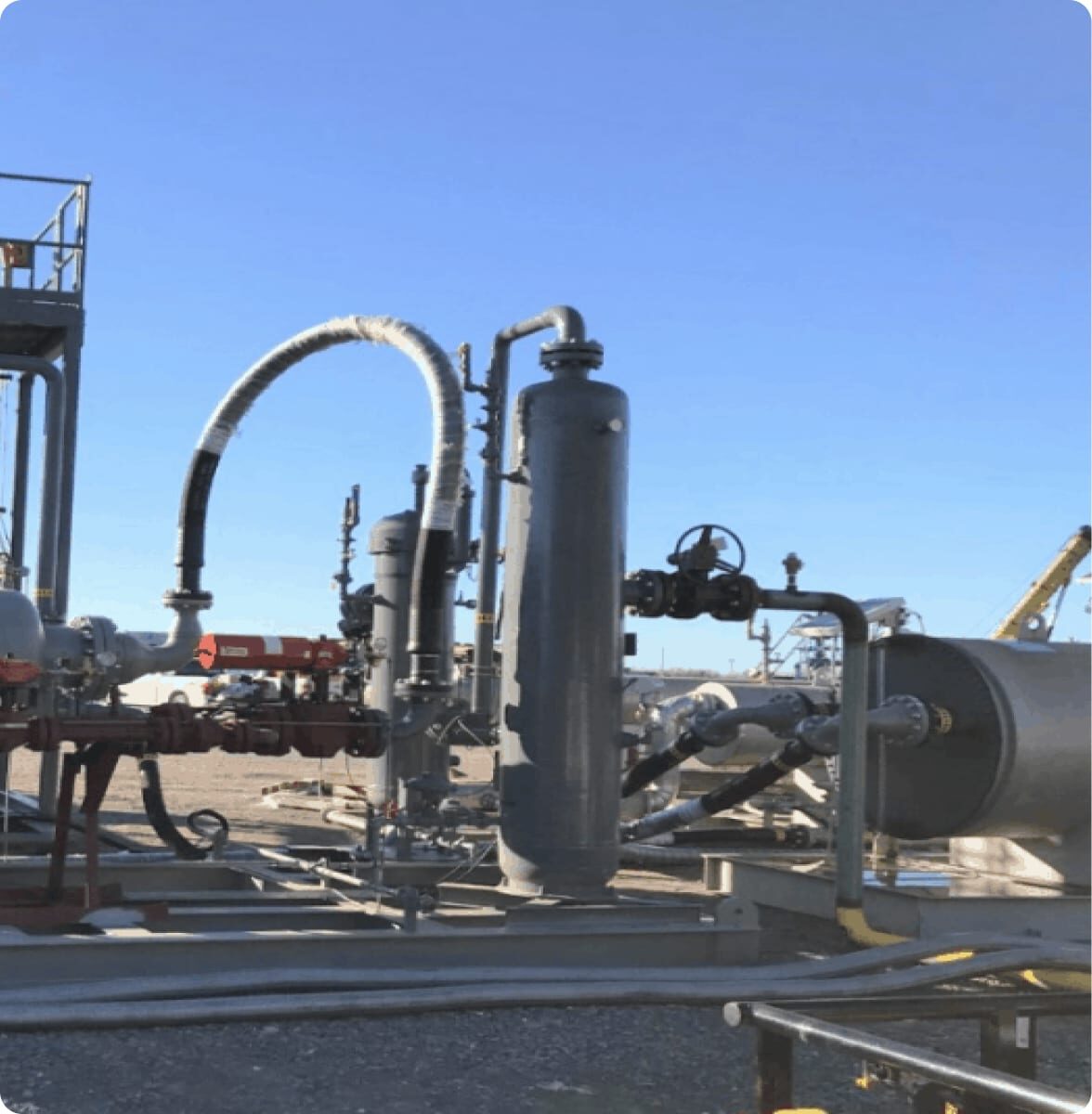 Drilling rig and frac fleet equipment on a well pad